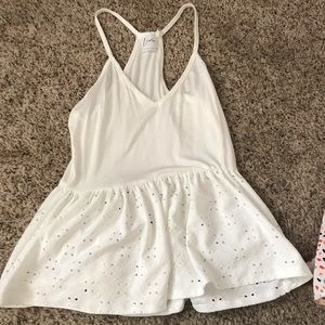 White crop top right in the top flowy on the bottom!